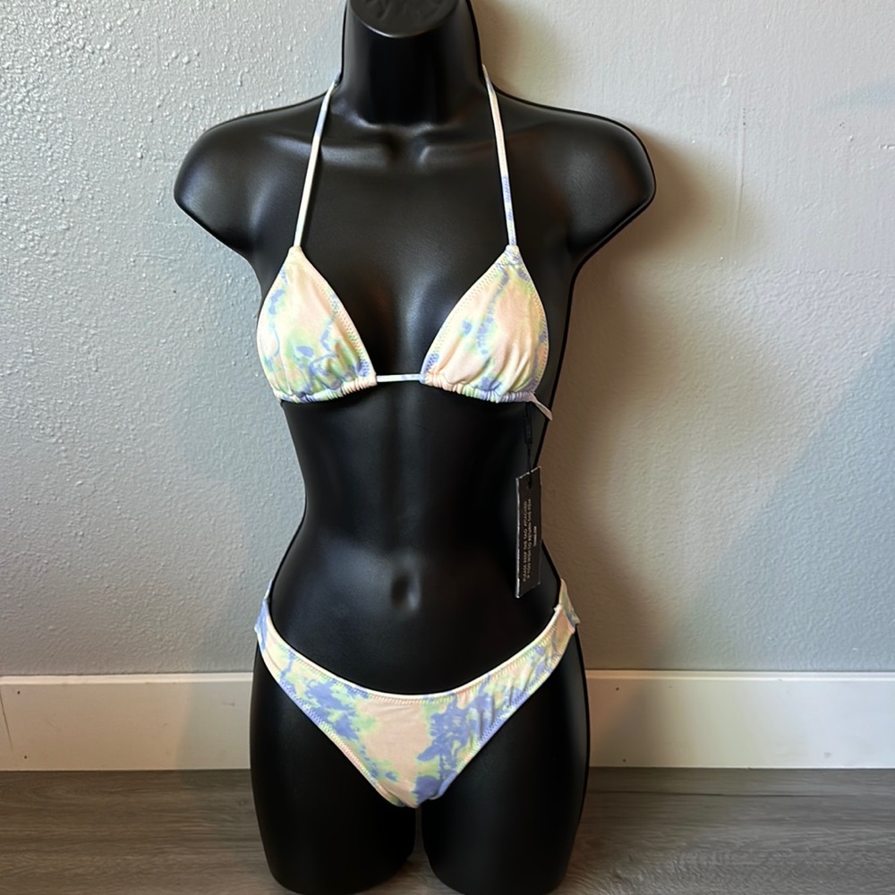 Tie Dye Triangl Normal coverage bottom with string top swimsuit set.